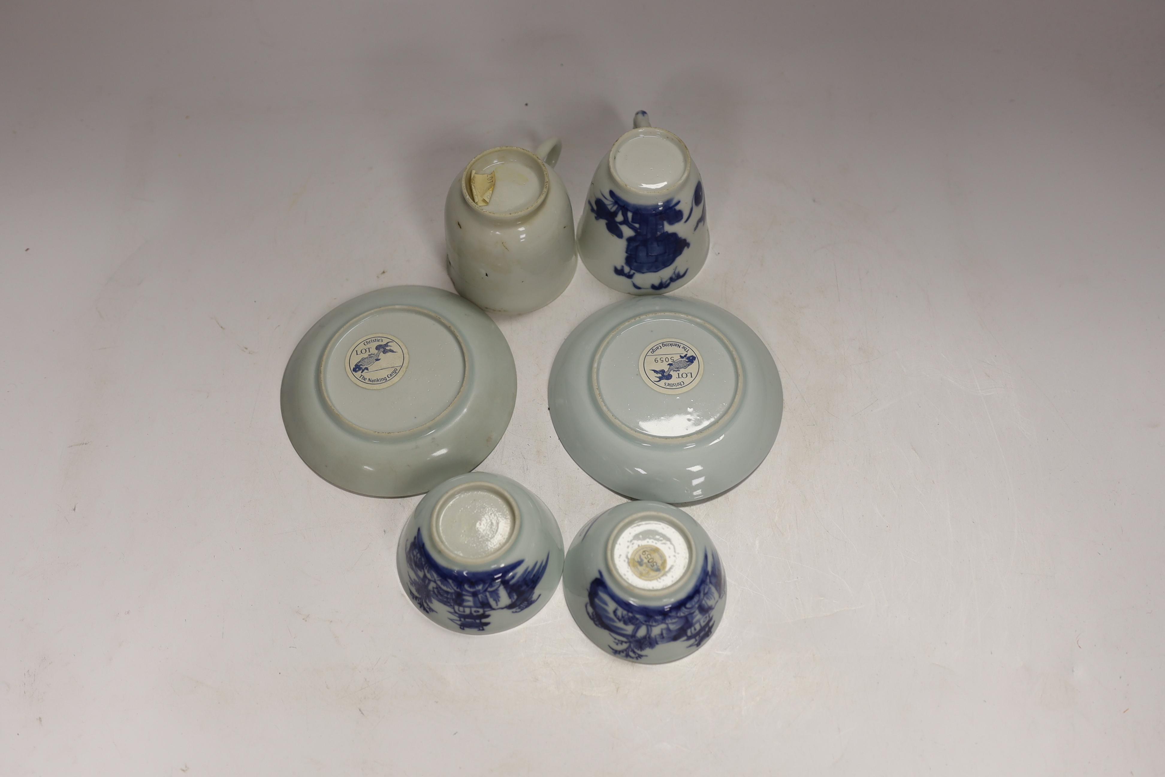 Two pairs of Chinese blue and white Nanking Cargo teabowls and saucers together with two other Chinese tea cups